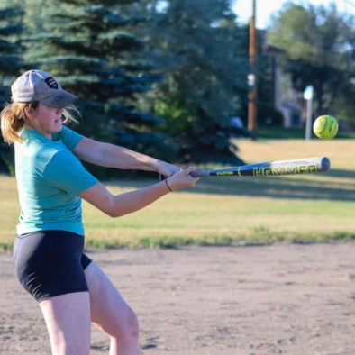 female engineer playing baseball