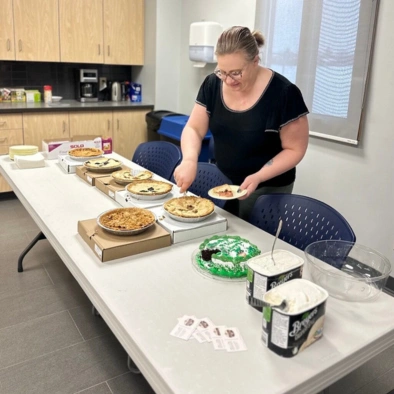 kova engineering team member taking food