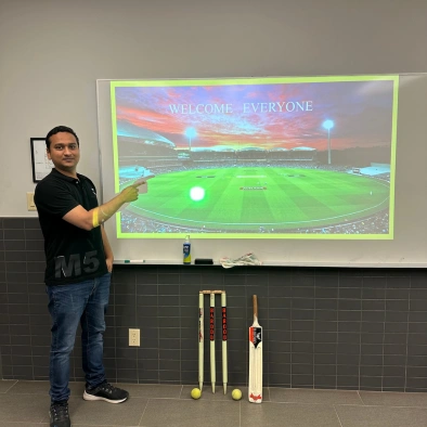 kova engineering team member with cricket bat and wicket