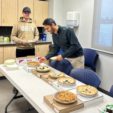 two kova engineering team member taking food